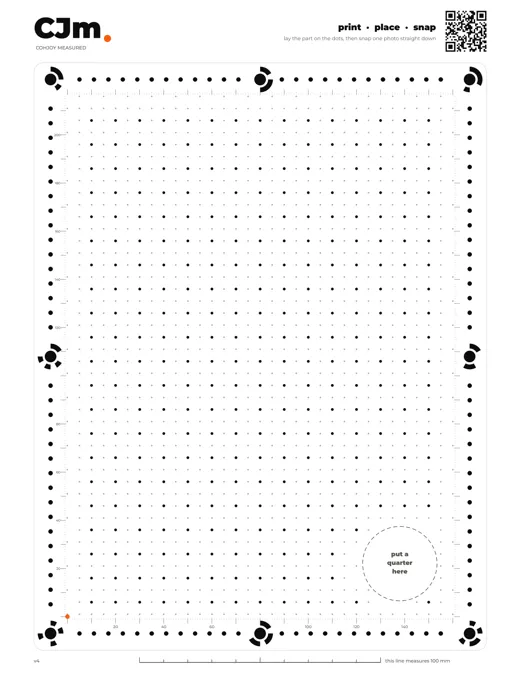 The CJm sheet: a grid of dots with round targets, millimeter rulers and a ring for a quarter