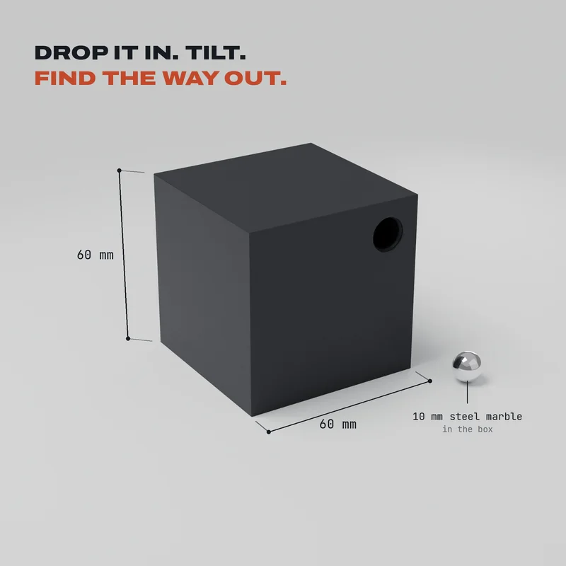 Drawing, not a photograph: the cube with its size, 60 mm on each side, and the 10 mm steel marble that comes in the box